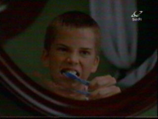 Caleb brushing his teeth.